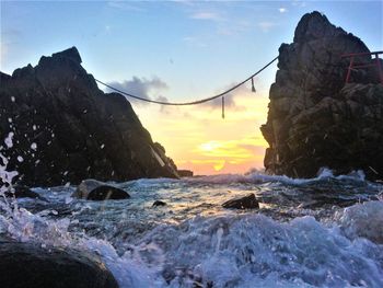 Scenic view of sea against sky during sunset