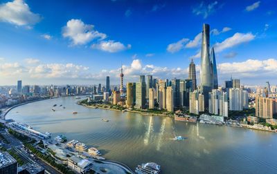 High angle view of huangpu river by cityscape