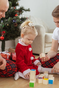 Mother playing with toys at home