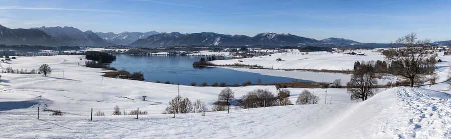 Scenic view of snowcapped mountains against sky