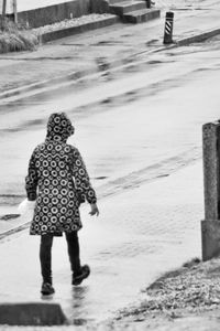 Rear view of woman on snow