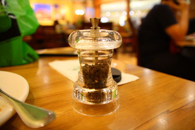 Close-up of beer in glass on table at restaurant