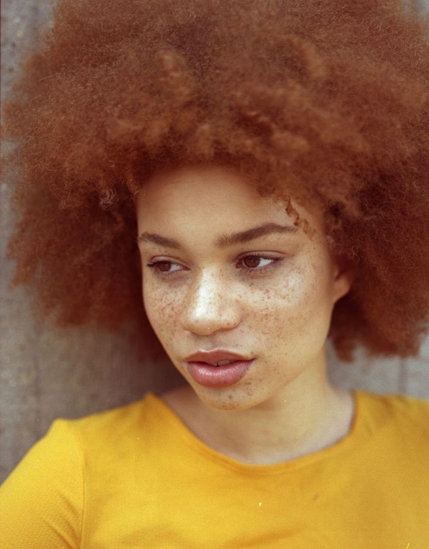 CLOSE-UP PORTRAIT OF A WOMAN