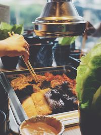 Close-up of person preparing food