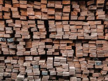 Full frame shot of logs in forest