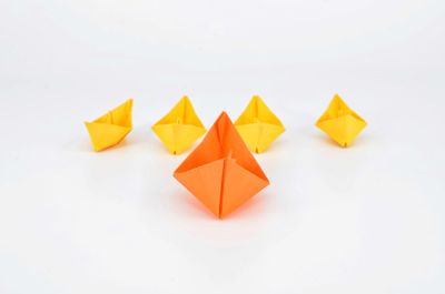 High angle view of paper boats on white background
