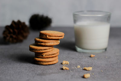 A glass of milk and biscuits for a healthy breakfast. suitable for diet program.