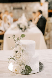 Close-up of wedding rings on table