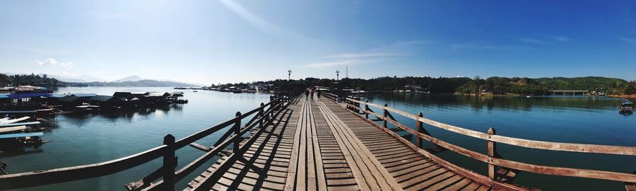 Panoramic view of bridge over river against sky