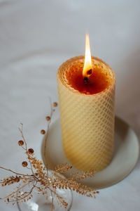 Close-up of illuminated candle