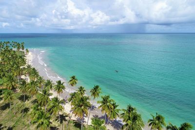 Scenic view of sea against cloudy sky