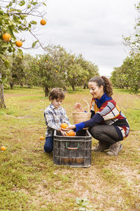 Two women sitting in basket