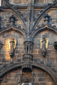 Low angle view of statue of historic building