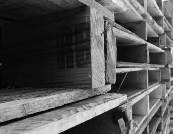 Full frame shot of wooden shelves in warehouse
