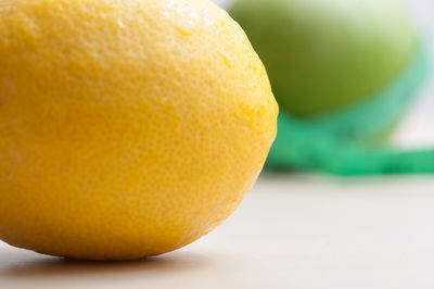 Close-up of lemon on table