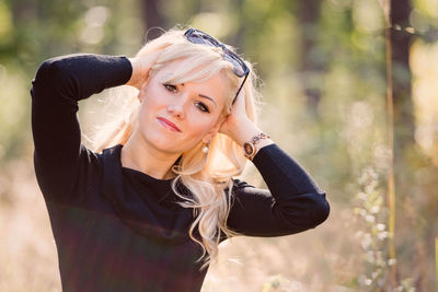 Portrait of young woman outdoors