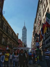 Group of people in city buildings