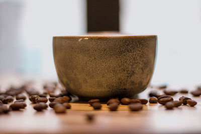 Close-up of coffee beans on table