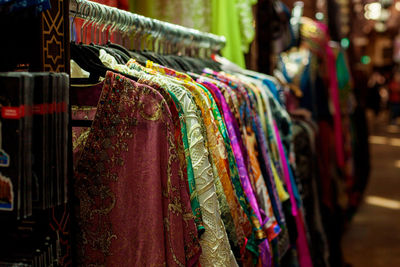 Sale of sarees of different colors on the eastern market, close-up