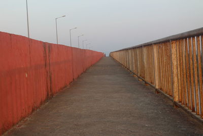 View of walkway against clear sky