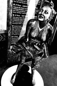 Portrait of woman standing with text