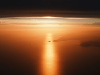 Scenic view of sea at sunset