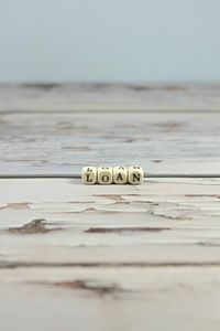 Close-up of text on table