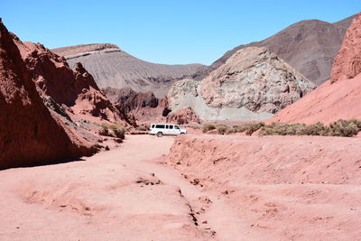 Scenic view of desert against clear sky