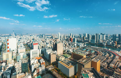 Aerial view of cityscape against sky