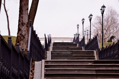 Low angle view of steps and building against clear sky