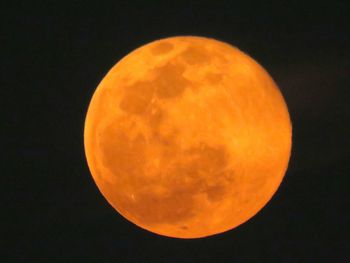 Low angle view of moon in sky