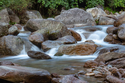 Stream flowing through rocks