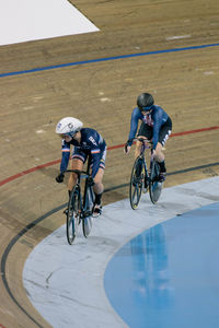 Men riding bicycle