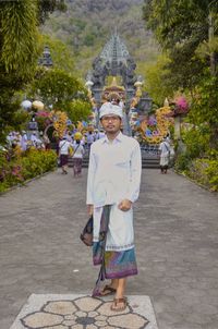 Portrait of man standing on temple