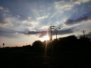 Electricity pylon at sunset