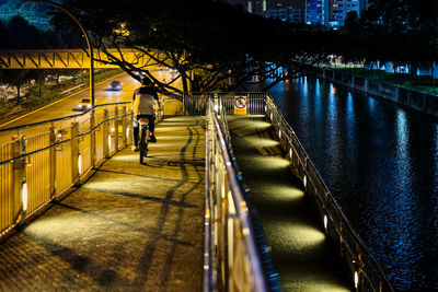 Woman walking on sidewalk
