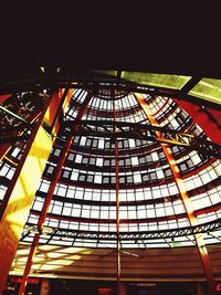 Low angle view of illuminated building at night