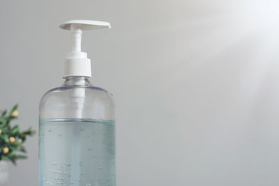 Close-up of bottle against white background