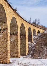 Viaduct in plebanivka village, terebovlyanskiy district of ukraine, on a sunny winter day