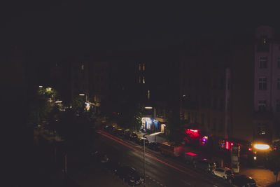 Traffic on road in city at night