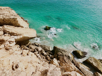 High angle view of rocks on beach