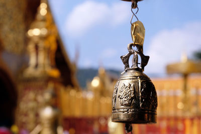 Close-up of bell against building