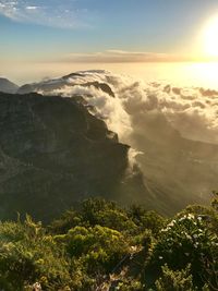 Scenic view of mountains against sky during sunset