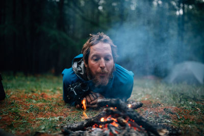 Portrait of a young man in the forest