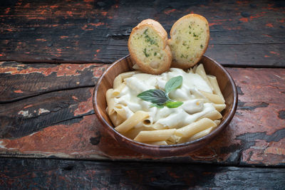 High angle view of pasta in bowl on table