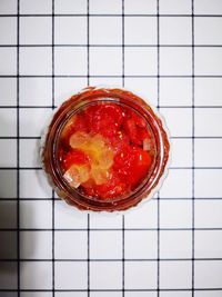 High angle view of strawberry in glass on table