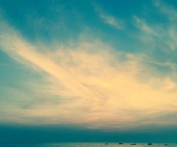 Low angle view of dramatic sky over sea