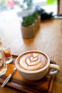 Coffee cup on table