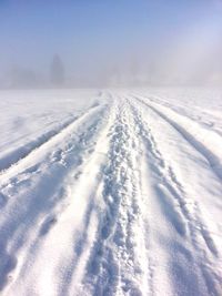 Scenic view of snow covered landscape