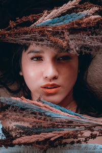 Portrait of woman wearing hat